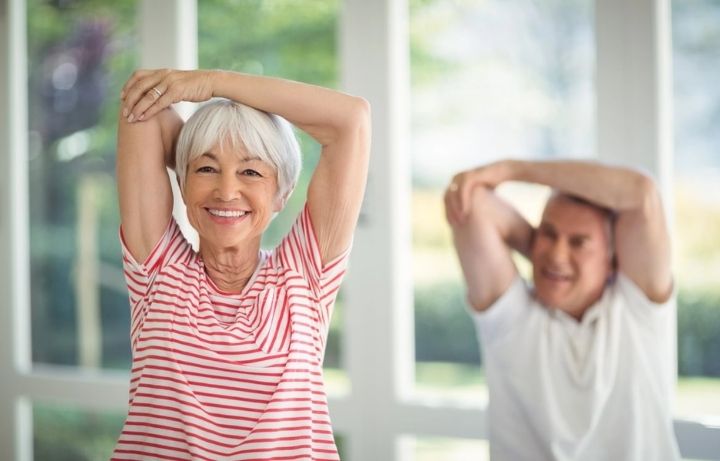 Happy couple do the fab 5 best exercises for over 55 